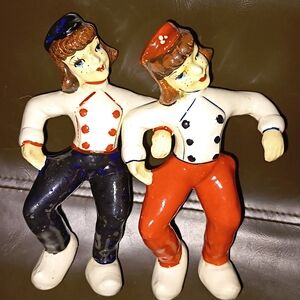 Kreiss adjoining 1950 s figurines.